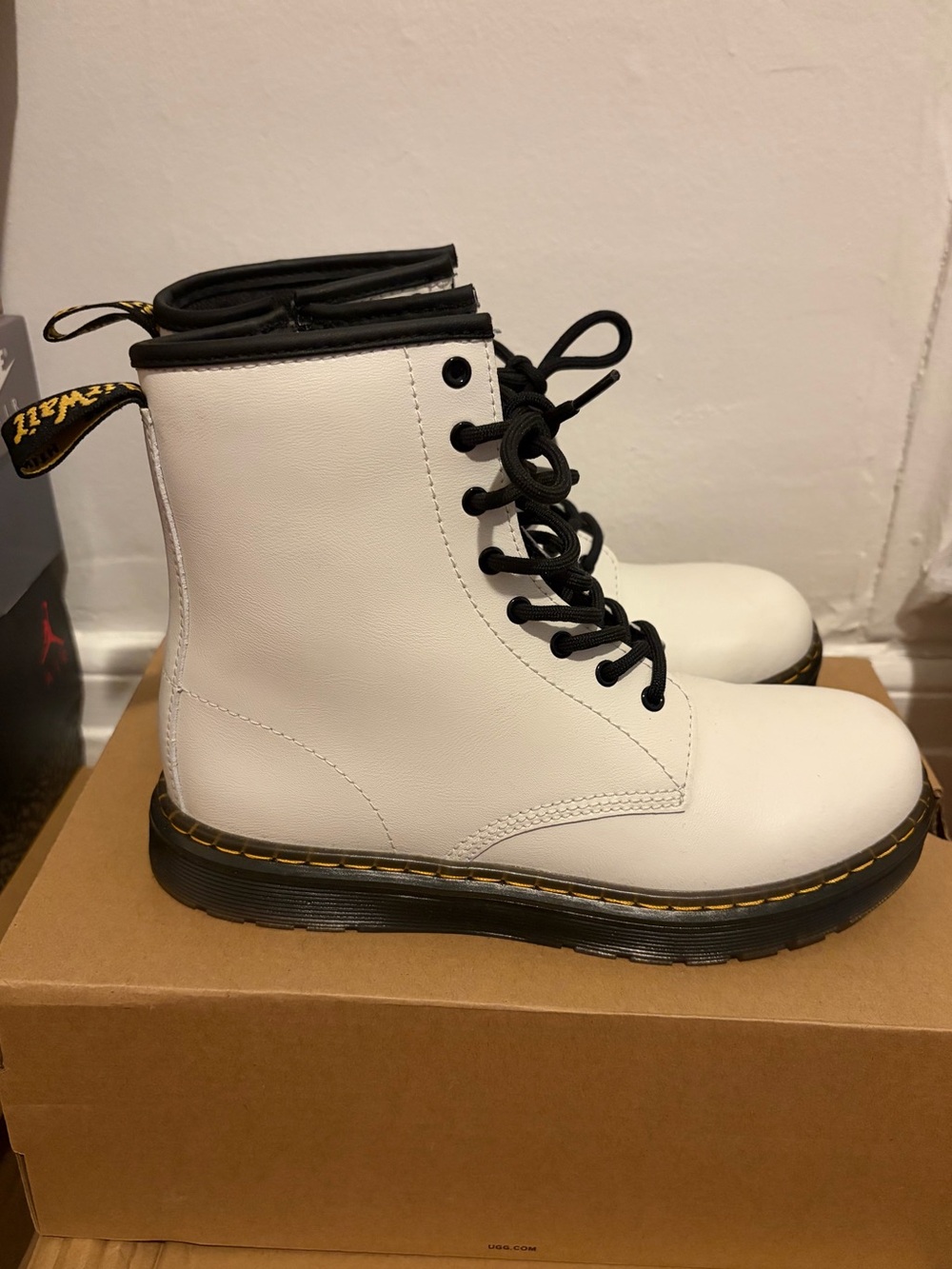 White Lace-Up Dr. Martens with Black Trim
